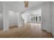 Spacious living room with hardwood floors, staircase and french doors at 1980 Flying Scotsman Dr # 10, Kennesaw, GA 30144