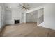 Bright living room featuring a fireplace and built-in shelving at 1980 Flying Scotsman Dr # 10, Kennesaw, GA 30144