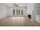 Bright living room featuring a fireplace and backyard access at 1980 Flying Scotsman Dr # 10, Kennesaw, GA 30144