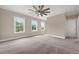 Spacious bedroom with ample natural light from three large windows at 1980 Flying Scotsman Dr # 10, Kennesaw, GA 30144