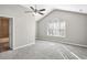 Bright bedroom featuring a ceiling fan and large window at 4658 Grand Central Pkwy, Decatur, GA 30035