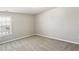 Spacious bedroom with neutral walls and carpet flooring at 4658 Grand Central Pkwy, Decatur, GA 30035