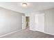 Spacious bedroom with neutral walls and carpet flooring at 4658 Grand Central Pkwy, Decatur, GA 30035