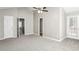 Spacious bedroom with carpet flooring and double doors at 4658 Grand Central Pkwy, Decatur, GA 30035