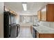 Eat-in kitchen boasting granite counters and a view to dining area at 4658 Grand Central Pkwy, Decatur, GA 30035