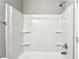 White shower with built in shelves at 4658 Grand Central Pkwy, Decatur, GA 30035