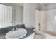 Clean bathroom featuring a bathtub, shower, and vanity with sink at 121 Rachel Blvd, Temple, GA 30179