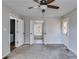 Spacious bedroom with ceiling fan and access to bathroom at 121 Rachel Blvd, Temple, GA 30179
