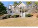 Two-story house with stone accents and a large yard at 121 Rachel Blvd, Temple, GA 30179