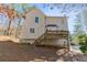 Two-story house with wooden deck and siding at 121 Rachel Blvd, Temple, GA 30179