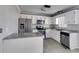 Spacious kitchen with an island, granite countertops, and stainless steel appliances at 121 Rachel Blvd, Temple, GA 30179