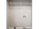 Basement with concrete floor, white walls, and white wire shelving at 3234 Bluebird Ln, Decatur, GA 30032