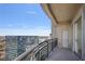 Balcony view featuring a skyline view, with black metal railing, and sliding glass doors at 3445 Stratford Ne Rd # 3602, Atlanta, GA 30326