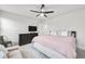 Main bedroom with king-size bed and built-in dresser at 727 Coneflower Way, Mcdonough, GA 30253