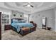 Large main bedroom with carpeted floors and ceiling fan at 1200 Bur Oak Ct, Mcdonough, GA 30252