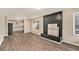 Living room with fireplace and wood-look floors at 165 Holly Nw Rd, Atlanta, GA 30314