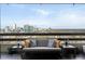 Large balcony offering panoramic city views and ample seating at 2660 Peachtree Rd # 27E, Atlanta, GA 30305