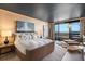 Main bedroom with city views and a dark ceiling at 2660 Peachtree Rd # 27E, Atlanta, GA 30305