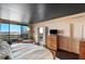 Main bedroom with city views and sitting area at 2660 Peachtree Rd # 27E, Atlanta, GA 30305