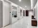 Elegant hallway with marble floors and modern design at 2660 Peachtree Rd # 27E, Atlanta, GA 30305