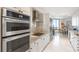 Modern kitchen with stainless steel appliances and granite countertops at 2660 Peachtree Rd # 27E, Atlanta, GA 30305