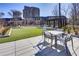 Landscaped green space with outdoor seating and city views at 2660 Peachtree Rd # 27E, Atlanta, GA 30305