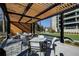 Outdoor patio with pergola, seating, and modern design at 2660 Peachtree Rd # 27E, Atlanta, GA 30305