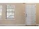 Entryway with white door and window blinds at 3607 Ginnis Sw Dr # 7, Atlanta, GA 30331