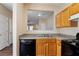 Kitchen features ample counter space, a dishwasher, and views into the home at 3607 Ginnis Sw Dr # 7, Atlanta, GA 30331