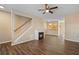 Living room with fireplace, hardwood floors and open concept at 3607 Ginnis Sw Dr # 7, Atlanta, GA 30331