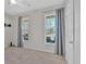 Bright bedroom featuring carpet and two windows at 501 Olympic Way, Acworth, GA 30102