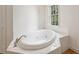 Relaxing bathroom with corner jetted tub at 521 E Wesley Ne Rd, Atlanta, GA 30305