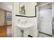 Classic bathroom with pedestal sink and shower at 521 E Wesley Ne Rd, Atlanta, GA 30305