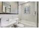 Clean bathroom with white tile and bathtub at 521 E Wesley Ne Rd, Atlanta, GA 30305