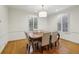 Formal dining room with hardwood floors and large windows at 521 E Wesley Ne Rd, Atlanta, GA 30305