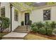 Steps leading to front door, flanked by greenery at 521 E Wesley Ne Rd, Atlanta, GA 30305