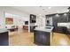 Eat-in kitchen with granite countertops and hardwood floors at 521 E Wesley Ne Rd, Atlanta, GA 30305