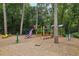 Community playground with playset and wood chips at 521 E Wesley Ne Rd, Atlanta, GA 30305