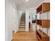 Light-filled entryway with hardwood floors and staircase at 521 E Wesley Ne Rd, Atlanta, GA 30305