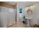 Elegant bathroom with pedestal sink, shower, and patterned tile at 679 N Central Ave, Hapeville, GA 30354