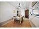 Dining room features a table, chairs, and antique cabinet at 679 N Central Ave, Hapeville, GA 30354