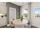 Kitchen breakfast nook with a round table and four chairs at 106 Delilah St, Mcdonough, GA 30252
