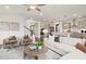 Open living space with a comfortable seating area and views into the kitchen at 106 Delilah St, Mcdonough, GA 30252