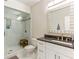 Basement bathroom with walk-in shower and granite countertop at 1185 Weldstone Ct, Atlanta, GA 30350