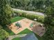 Community playground with slides and swings at 1185 Weldstone Ct, Atlanta, GA 30350