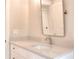 Bright bathroom showcasing a vanity with light countertop, complemented by modern fixtures at 43 Iroquois Ct, Covington, GA 30014