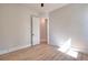Bedroom features a ceiling fan, wood floors, and neutral paint at 43 Iroquois Ct, Covington, GA 30014