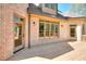 Spacious wooden deck with access to the yard, enhanced by brick exterior and natural light at 43 Iroquois Ct, Covington, GA 30014