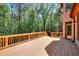 Expansive wooden deck perfect for outdoor entertaining and enjoying the wooded surroundings at 43 Iroquois Ct, Covington, GA 30014