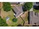 Aerial view showcasing house, large backyard, and detached shed at 2401 Centennial Hill Nw Way, Acworth, GA 30102